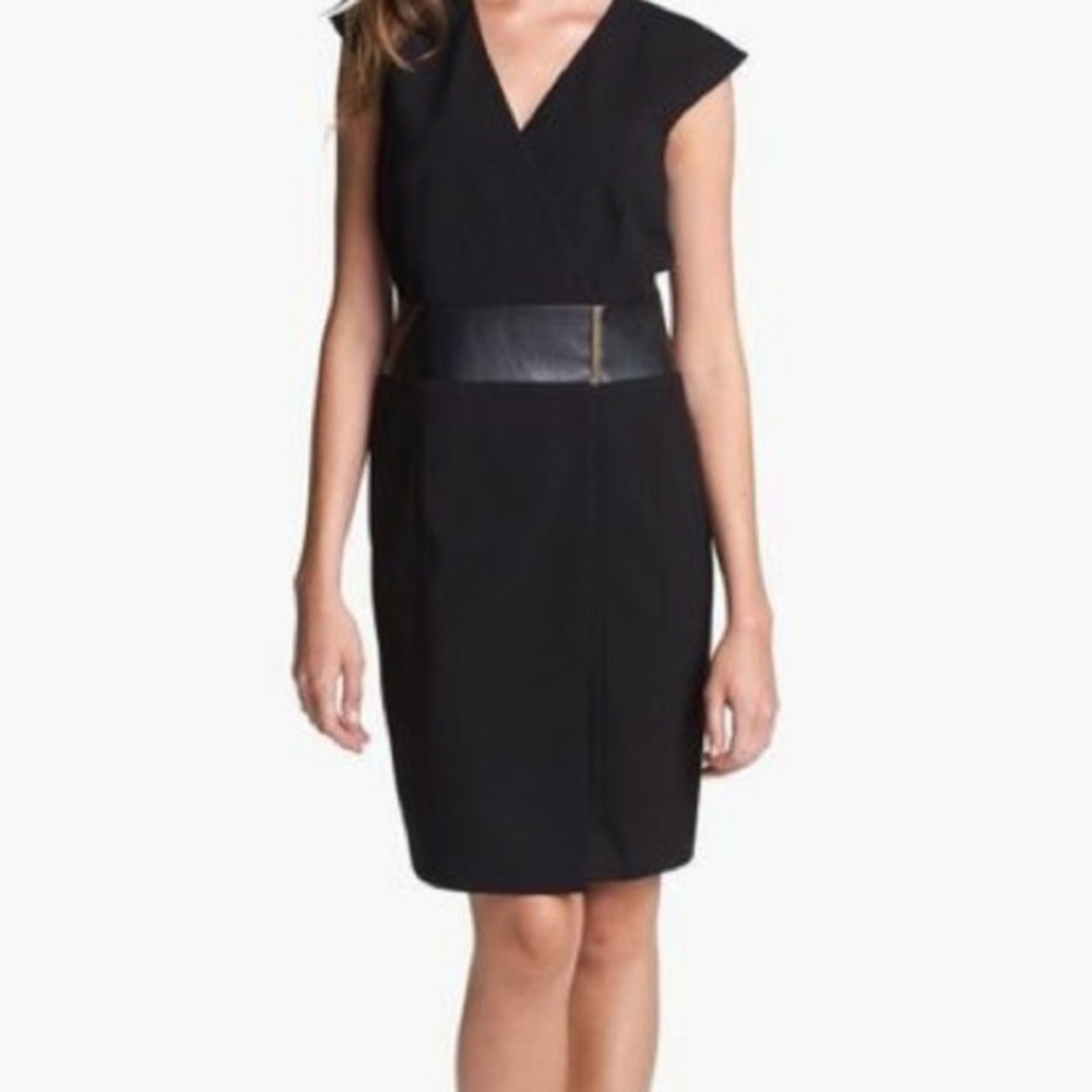 Calvin Klein black faux-wrap sleeveless dress.